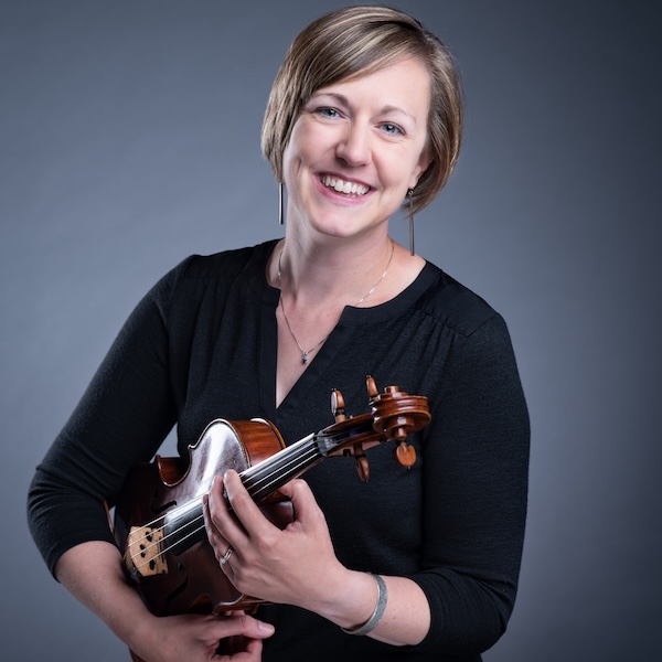 Dr. Lindsay J. Fulcher holding violin