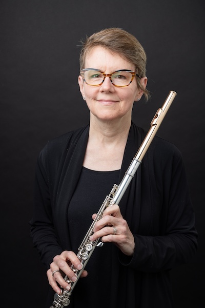 Dr. Nancy Schneeloch-Bingham with flute