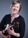 Dr. Lindsay J. Fulcher holding violin