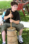 student churning butter